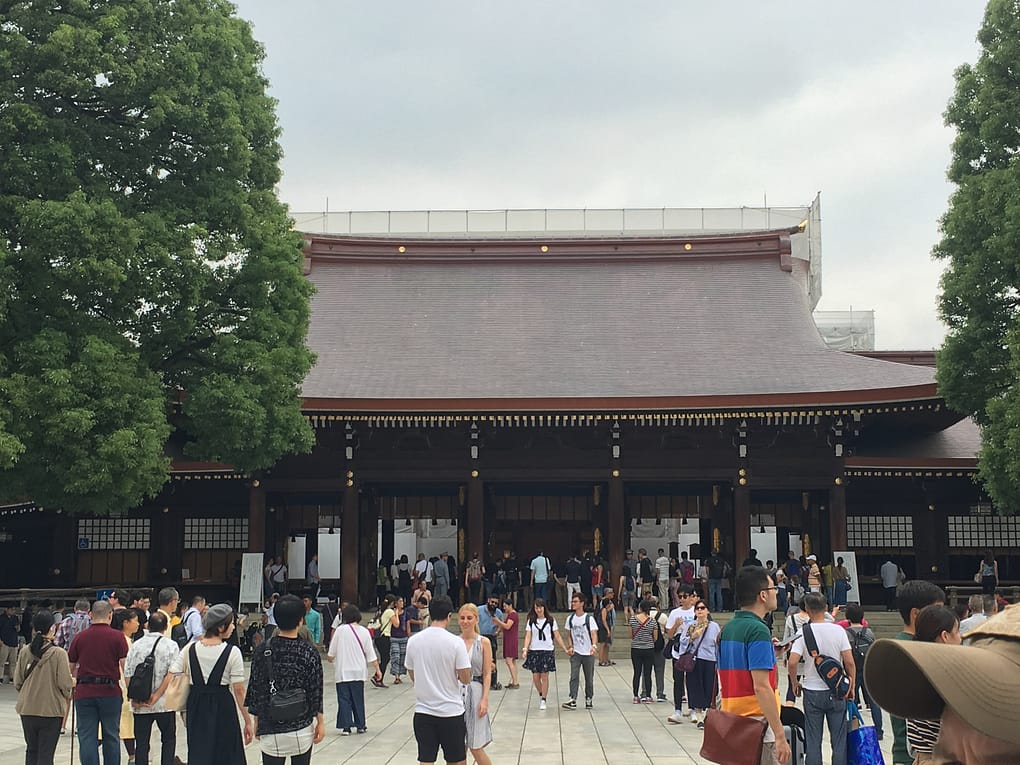 Meiji main hall with visitors in front.