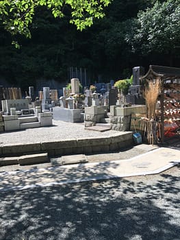 Stone monuments stacked close together form a Buddhist cemetery