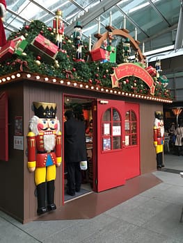 A wooden stall decorated with a large nutcracker