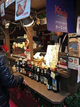 A selection of bottled beers for sale at a stall