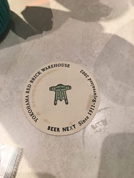 A coaster from one of the bars at the red brick warehouse