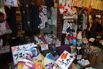 A colorful array of items for sale at a stall in Chinatown