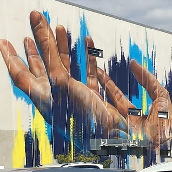 A mural of hands in New Zealand, spring 2019