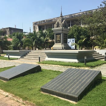 A memorial site to all the prisoners and victims killed at S-21. Two large stone tablets are situated in front of a smaller shrine-like building on a raised platform