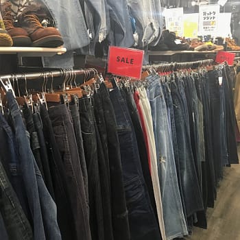 TreFac Style thrift stores offer a large selection of western brands. A long rack of jeans on sale will fit every budget