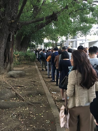 A line of people wait for entrance to the Ueno Royal Museum